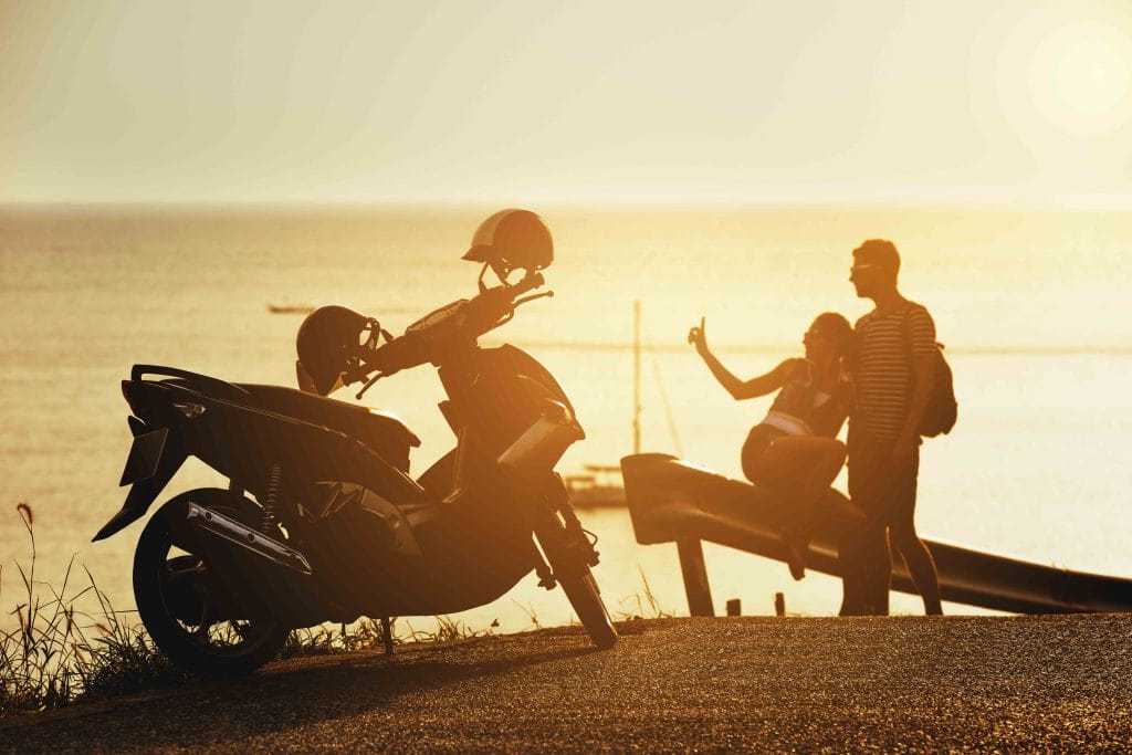 people and a moto