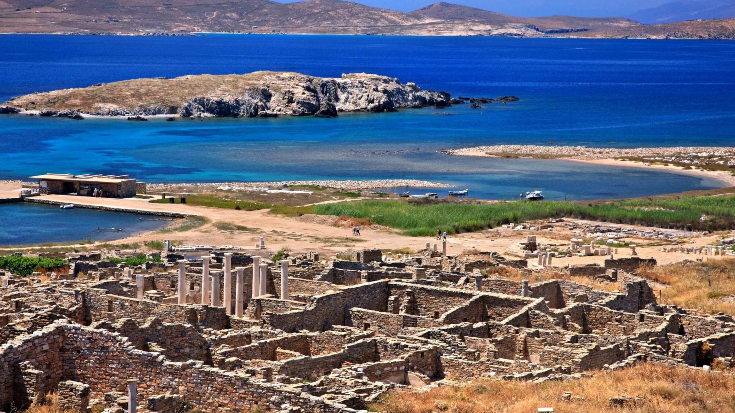 At,The,Archaeological,Site,Of,The,”sacred”,Island,Of,Delos, At the archaeological site of the "sacred" island of Delos, Municipality of Mykonos, Cyclades, Greece.. In the background, Rineia island.